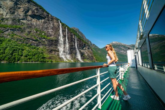 Cruise through Geirangerfjord and see the stunning waterfalls (credit: norwaysbest.com)