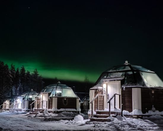 Northern Lights on Christmas Eve at the Arctic SnowHotel & Glass Igloos
